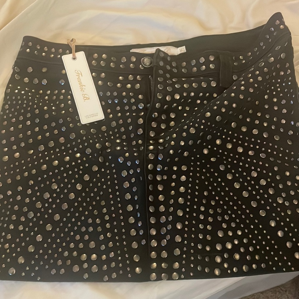 Frankie B. Super cute black denim mini with metal accents